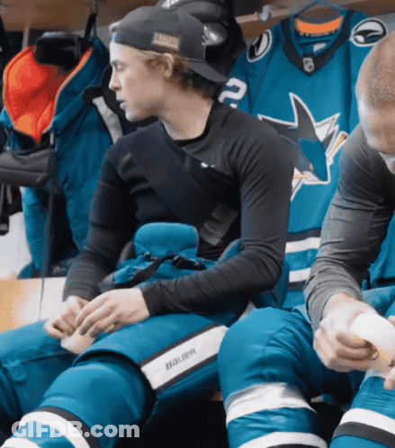 Hockey Player Number 2 In Locker Room GIF