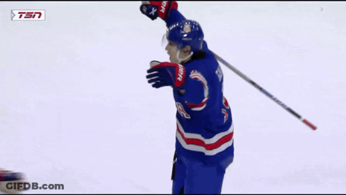 Hockey Player Number 20 Hugging Another Player GIF