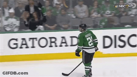 Hockey Player Number 21 Standing On Ice GIF