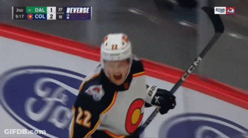 Hockey Player Number 22 Holding Stick GIF