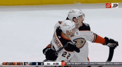 Hockey Player Number 22 Hugging GIF