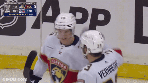 Hockey Player Number 23 Hugging Another Player GIF