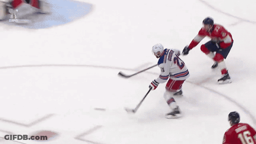 Hockey Player Number 23 Skating On Ice GIF