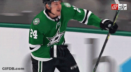 Hockey Player Number 24 Holding Stick GIF