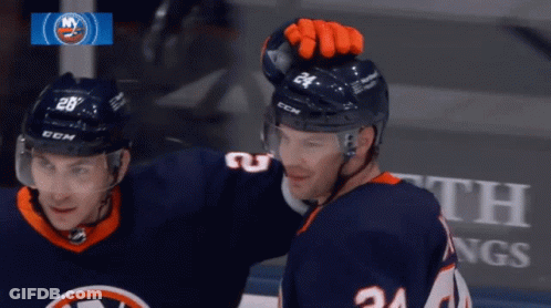 Hockey Player Number 24 Standing Next To Another Player GIF
