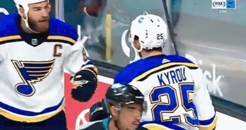 Hockey Player Number 25 Talking To Another GIF