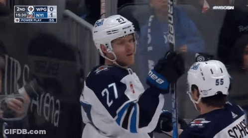 Hockey Player Number 27 Holding Stick GIF