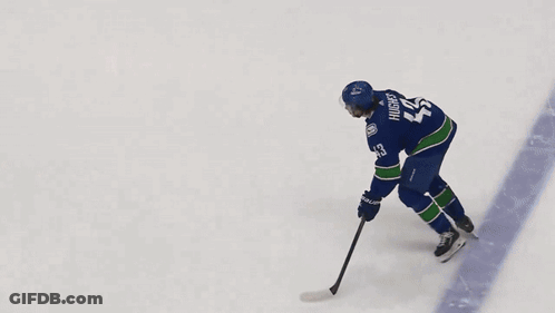 Hockey Player Number 28 Skating On Ice GIF