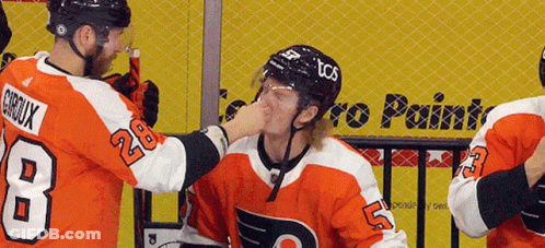 Hockey Player Number 28 Wiping Nose GIF