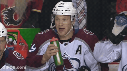 Hockey Player Number 29 Holding Green Bottle GIF