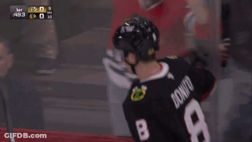 Hockey Player Number 29 Hugging Another Player GIF