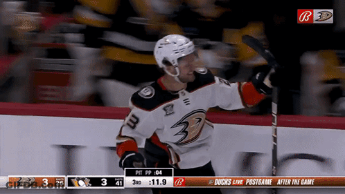 Hockey Player Number 3 Holding Stick GIF