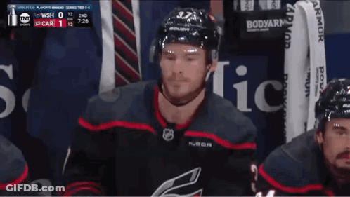 Hockey Player Number 33 In Stands GIF