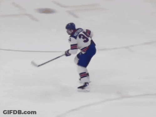 Hockey Player Number 34 Skating On Ice GIF
