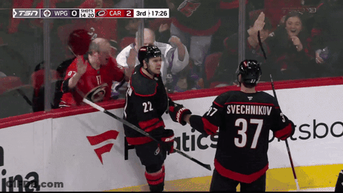 Hockey Player Number 37 Shaking Hands GIF