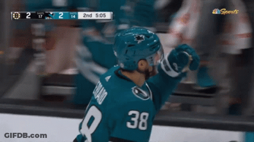 Hockey Player Number 38 Giving High Five GIF