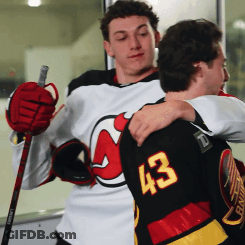 Hockey Player Number 43 Hugging GIF