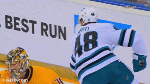 Hockey Player Number 48 Running GIF