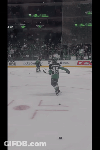 Hockey Player Number 49 Skating On Ice GIF