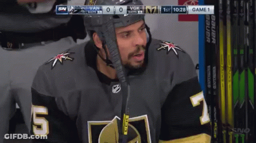 Hockey Player Number 5 Sitting In Dugout GIF