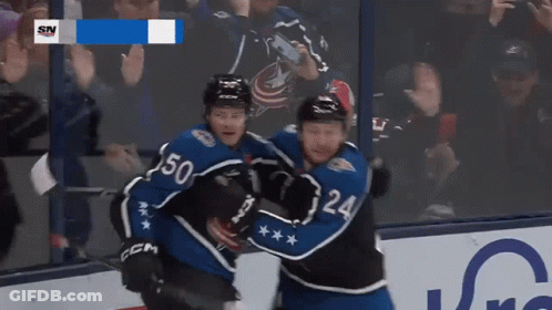 Hockey Player Number 50 Hugging Another Player GIF