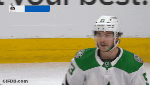 Hockey Player Number 53 On Helmet On Ice GIF