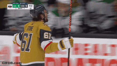Hockey Player Number 61 Holding Hockey Stick GIF