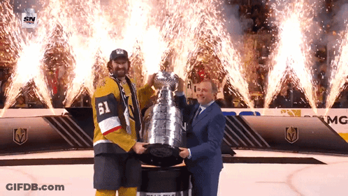 Hockey Player Number 61 Holding Trophy GIF