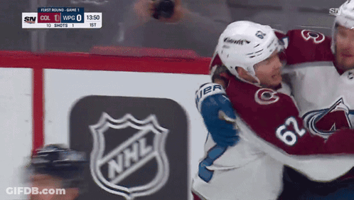 Hockey Player Number 62 Hugging Another Player GIF
