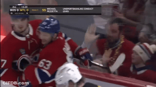 Hockey Player Number 63 Surrounded GIF