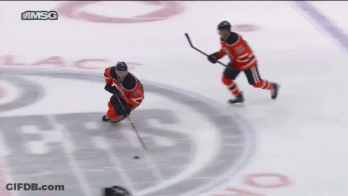Hockey Player Number 7 Jumping Over Fence GIF