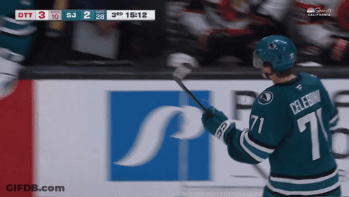 Hockey Player Number 71 Holding Stick GIF