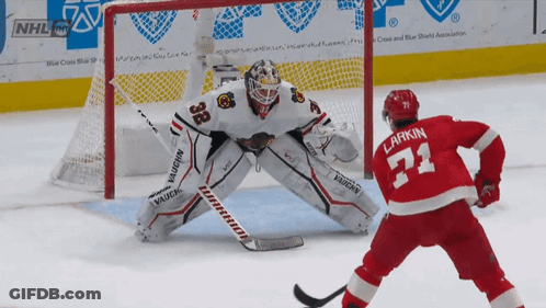 Hockey Player Number 71 In Front Of Goalie GIF