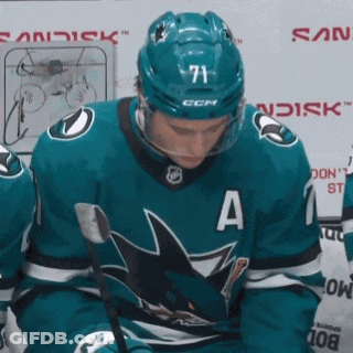 Hockey Player Number 71 Looking Down GIF