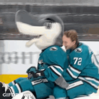 Hockey Player Number 72 Hugs Mascot GIF