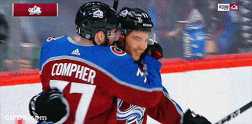 Hockey Player Number 77 Hugging Teammate GIF