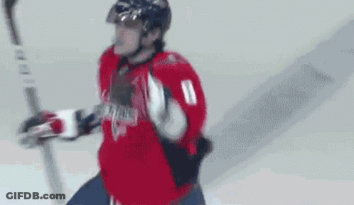 Hockey Player Number 8 Holding Hockey Stick GIF