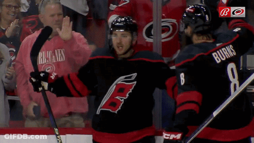 Hockey Player Number 8 Next To Another Player GIF