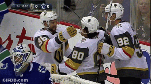 Hockey Player Number 80 Hugged By Two Players GIF