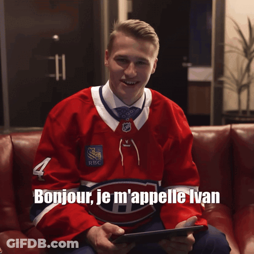 Hockey Player On Couch Holding Tablet Bonjour Je M'appelle Ivan GIF