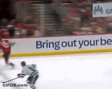 Hockey Player On Ice With Bring Out Your Bee Banner GIF