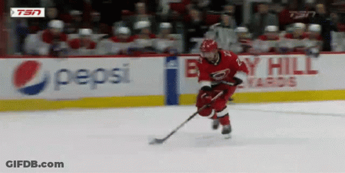 Hockey Player On Ice With Pepsi Sign GIF