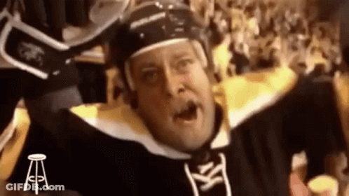 Hockey Player Raising Arms In Helmet GIF