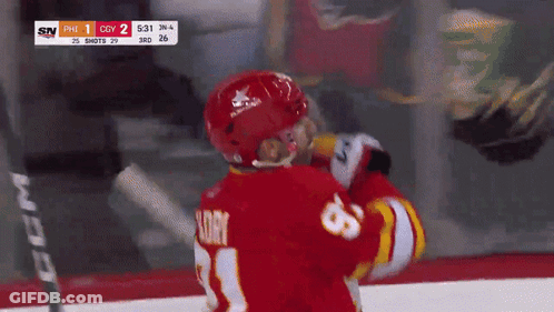 Hockey Player Red Jersey Number 11 GIF