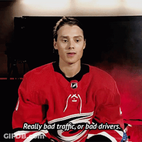 Hockey Player Red Jersey Saying Really Bad Traffic GIF