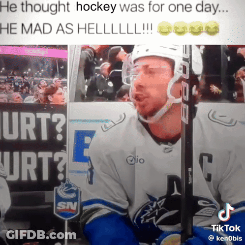 Hockey Player Sitting By Urt Sign GIF
