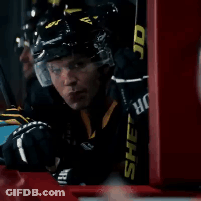 Hockey Player Sitting On Bench GIF