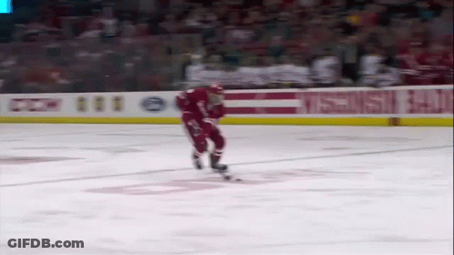 Hockey Player Skating In Front Of CCM Banner GIF