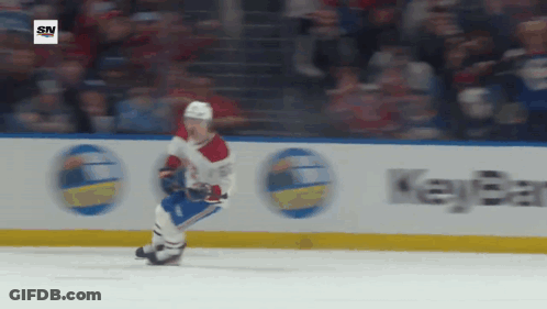 Hockey Player Skating In Front Of Key Bank Sign GIF