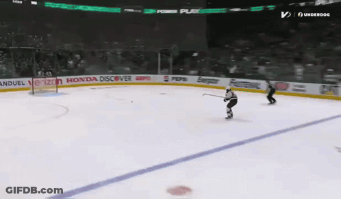 Hockey Player Skating On Ice GIF